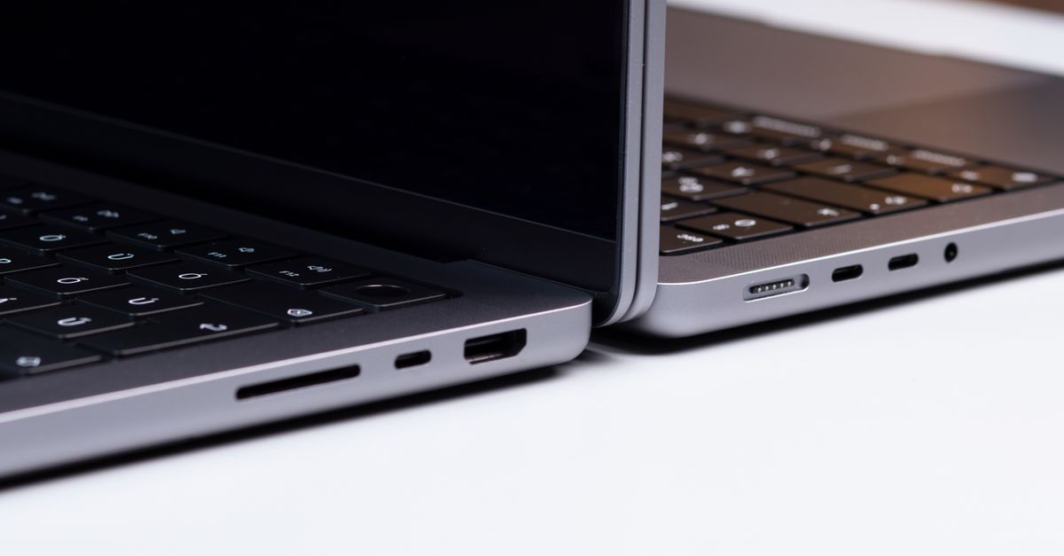 Detailed close-up of two laptops showcasing sleek design and modern technology.