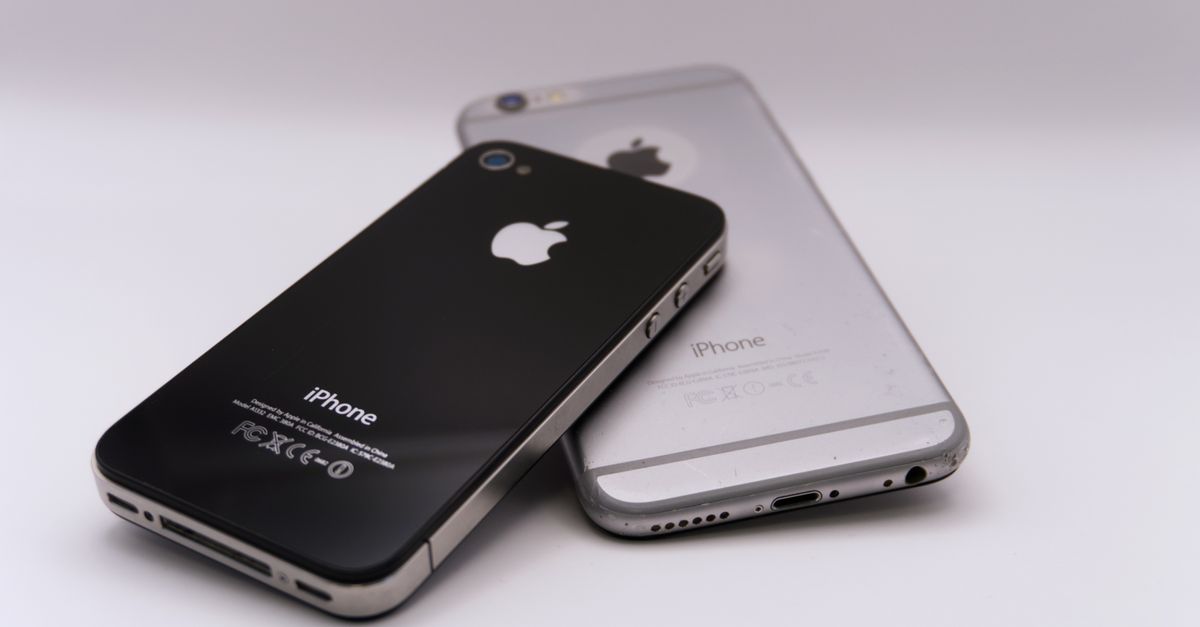 Two smartphones displayed on a white surface, showcasing modern technology.