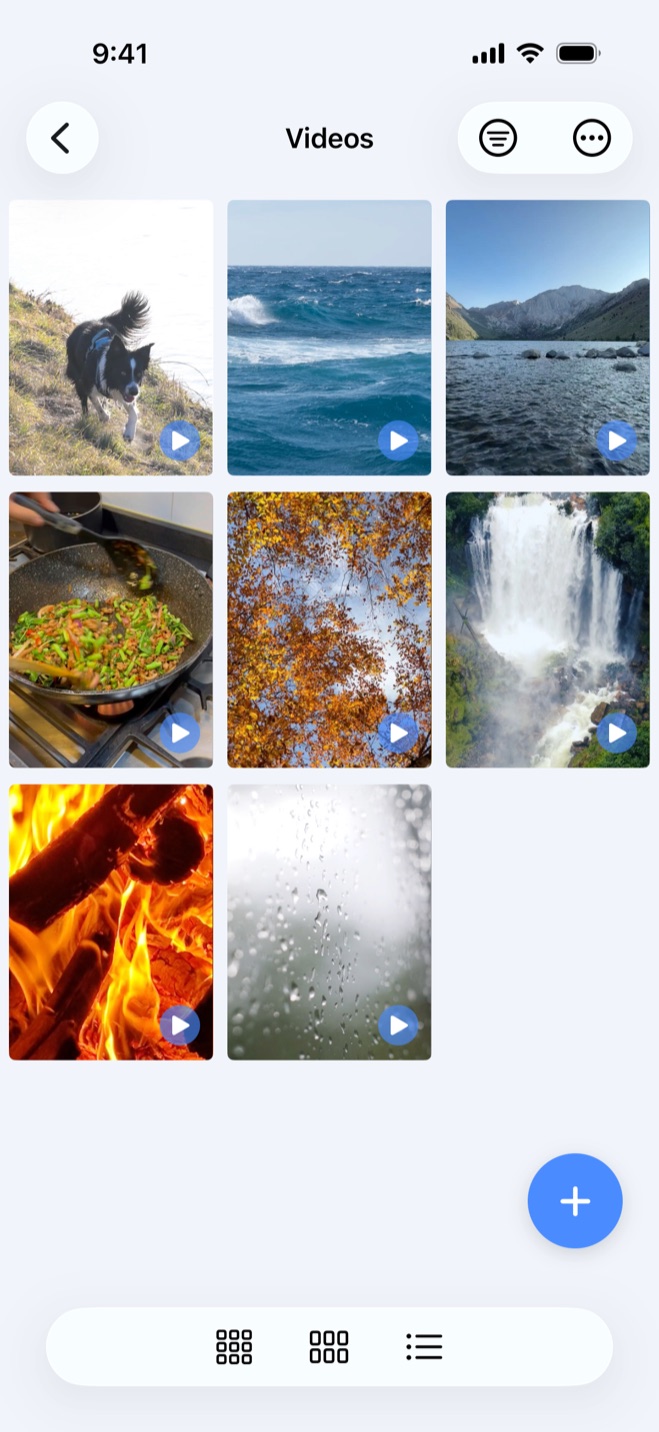 Video vault app screen titled “Videos” showing eight private video thumbnails with play icons on iPhone.